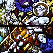 Medieval Stained Glass in ludlow Church featuring the Martyrdom of St. Lawrence on a Gridiron